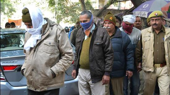 The convicted police officers leave CBI court after their sentencing in Ghaziabad on Wednesday. (Sakib Ali/HT Photo)