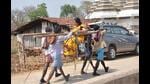 A pilgrim being carried to the hill top at Parasnath hills in Giridih in Jharkhand. (HT Photo)