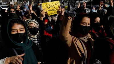 Afghan women chant slogans in protest against the closure of universities to women by the Taliban in Kabul, Afghanistan (REUTERS)
