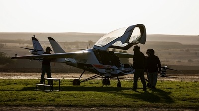 Employees of Israeli startup AIR work on a prototype of AIR ONE, an electric vehicle designed to fly commuters on short trips far above streets overcrowded with cars. (REUTERS)