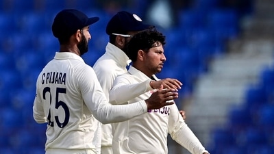 India's Kuldeep Yadav (R) celebrates with teammates after the dismissal of Bangladesh's Shakib Al Hasan (not pictured) during the fifth day of the first cricket Test match between Bangladesh and India at the Zahur Ahmed Chowdhury Stadium in Chittagong on December 18, 2022. (Photo by Munir uz ZAMAN / AFP) (AFP) India's Kuldeep Yadav (R) celebrates with teammates after the dismissal of Bangladesh's Shakib Al Hasan (not pictured) during the fifth day of the first cricket Test match between Bangladesh and India at the Zahur Ahmed Chowdhury Stadium in Chittagong on December 18, 2022. (Photo by Munir uz ZAMAN / AFP) (AFP)