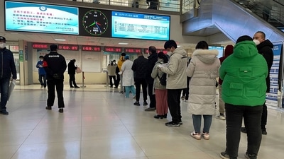 Visitors line up at Baoding No. 2 Central Hospital in Zhuozhou city in northern China's Hebei province on Wednesday (AP)