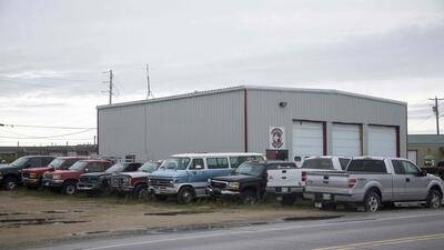 Pick-up, van and cars in Churchill, Manitoba, northern Canada. (AFP) Pick-up, van and cars in Churchill, Manitoba, northern Canada. (AFP)