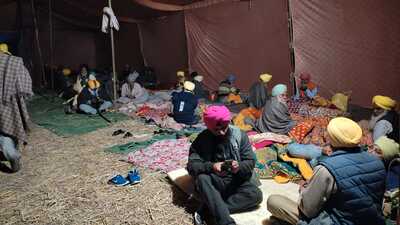 The protesters sitting in tents outside Malbros International Private Limited, an alcohol-making unit, in Mansurwal village of Zira assembly segment in Ferozepur on Thursday. (HT Photo) The protesters sitting in tents outside Malbros International Private Limited, an alcohol-making unit, in Mansurwal village of Zira assembly segment in Ferozepur on Thursday. (HT Photo)