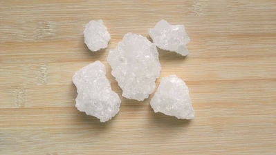 Mishri is formed from sugar cane sap that is boiled and diluted and left to crystallise naturally. Sometimes milk is also added during the process to make it white. Crystallised red or white one with thread are authentic and pure rock sugar. (depositphoto)