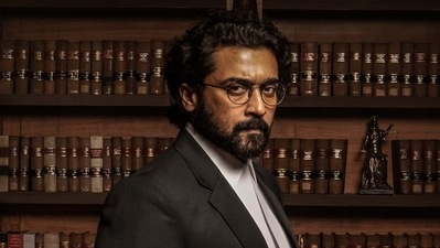 Suriya on the poster for Jai Bhim. Suriya on the poster for Jai Bhim.