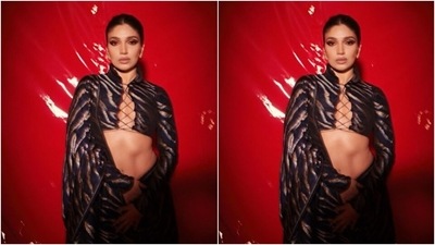 Bhumi looked gorgeous as ever in the black and golden animal striped saree. She teamed it with a statement matching blouse with full sleeves, and featuring netted details at the neckline. (Instagram/@rheakapoor) Bhumi looked gorgeous as ever in the black and golden animal striped saree. She teamed it with a statement matching blouse with full sleeves, and featuring netted details at the neckline. (Instagram/@rheakapoor)