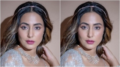 Assisted by makeup artist Sachin Salvi, Hina decked up in silver eyeshadow, mascara-laden eyelashes, drawn eyebrows, contoured cheeks and a shade of pink lipstick. (Instagram/@realhinakhan) Assisted by makeup artist Sachin Salvi, Hina decked up in silver eyeshadow, mascara-laden eyelashes, drawn eyebrows, contoured cheeks and a shade of pink lipstick. (Instagram/@realhinakhan)