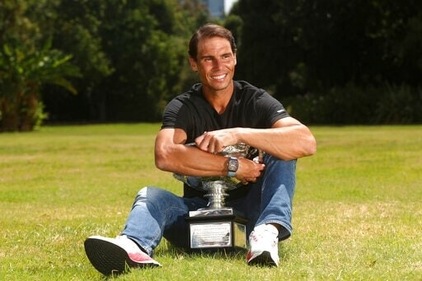 Men's singles champion Rafael Nadal of Spain poses for a photo with his trophy at Government House after the Australian Open in Melbourne, (AP) Men's singles champion Rafael Nadal of Spain poses for a photo with his trophy at Government House after the Australian Open in Melbourne, (AP)