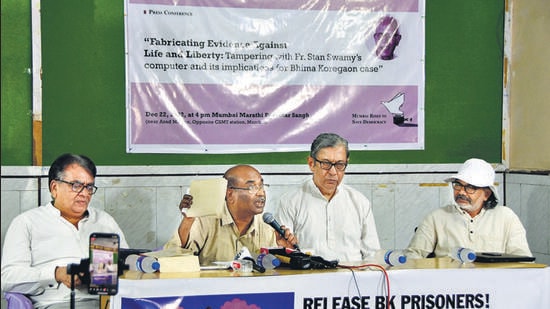 Mumbai, India - December 22, 2022: Mihir Desai, Senior Advocate at High Court of Bombay, Fr. Joe Xavier, Convenor of Fr. Stan Swamy Legacy Committee of the Jesuits, Fr. Frazer Mascarenhas, Former Principal of St. Xavier's College in Mumbai along with Nagarjuna G., Former Professor of Homi Bhabha Centre for Science Education, TIFR, during the press conference on “Fabricating Evidence Against Life & Liberty: Tampering with Fr. Stan Swamy’s computer and its implications for Bhima Koregaon case, at Mumbai Marathi Patrakar Sangh (MMPS), near Azad Maidan, in Mumbai, India, on Thursday, December 22, 2022. (Photo by Bhushan Koyande/HT Photo) (HT PHOTO)