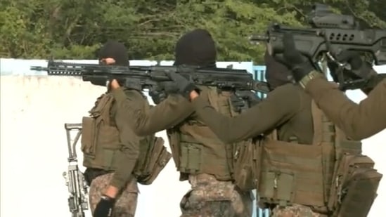 The nearly eight-minute long video shows Garud Special Forces soldiers in various drills - shooting at targets in different positions.(ANI)