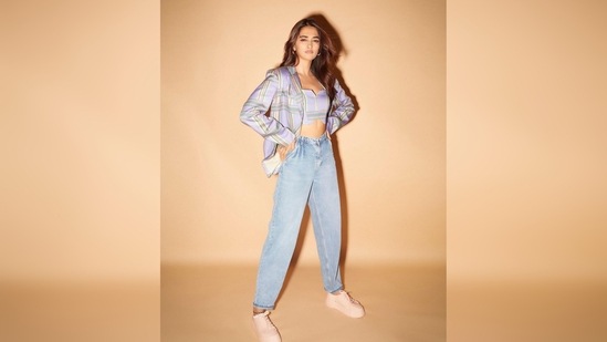 Pooja Hegde wore a cropped blouse and jacket set which she paired with ankle-length denim and sneakers. (Instagram/@hegdepooja)