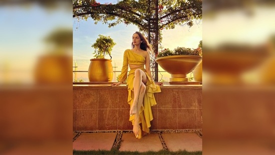 Manushi Chhillar shared a slew of images of herself acing the look and captioned her post, "Sunset paints thy sky." (Instagram/@manushi_chhillar)