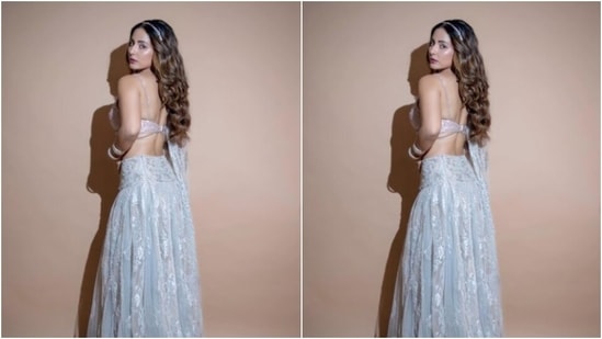 Hina played muse to fashion designer Shehla Khan and picked a silver lehenga from the shelves of the designer. (Instagram/@realhinakhan)