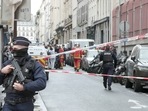 Paris Shooting: Members of emergency services work at the site where gunshots were fired.