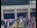 Man flies after wearing a jet pack. Man flies after wearing a jet pack.
