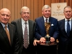Members of the England 1966 World Cup winning team, from left, George Cohen, Gordon Banks, Martin Peters and Geoff Hurst pose for the media with the official English Football Association replica of the Jules Rimet trophy, at the Royal Garden Hotel in London Tuesday, Jan. 5, 2016. George Cohen, the right-back for England World Cup-winning team of 1966, has died aged 83, his former club Fulham have announced on Friday, Dec. 23, 2022. 
