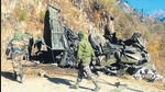 Army personnel near the wreckage of the truck in Zema area of North Sikkim on Friday. (ANI) Army personnel near the wreckage of the truck in Zema area of North Sikkim on Friday. (ANI)