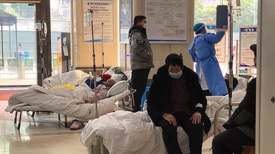 Covid-19 coronavirus patients rest on hospital beds (AFP) Covid-19 coronavirus patients rest on hospital beds (AFP)