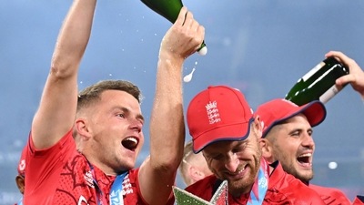 Sam Curran celebrates after England won the T20 World Cup in Australia (AFP) Sam Curran celebrates after England won the T20 World Cup in Australia (AFP)