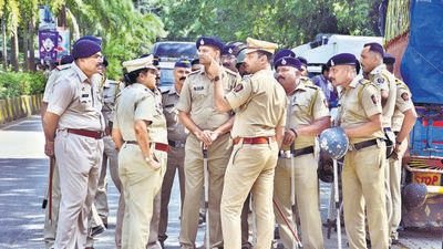 Mumbai, India - July 31, 2022: Heavy police bandobast outside Maitri residence of Shiv Sena MP Sanjay Raut while the Enforcement Directorate (ED) raids for a search operation in the morning, at Bhandup, in Mumbai, India, on Sunday, July 31, 2022. (Praful Gangurde/HT Photo) (HT PHOTO) Mumbai, India - July 31, 2022: Heavy police bandobast outside Maitri residence of Shiv Sena MP Sanjay Raut while the Enforcement Directorate (ED) raids for a search operation in the morning, at Bhandup, in Mumbai, India, on Sunday, July 31, 2022. (Praful Gangurde/HT Photo) (HT PHOTO)