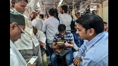 Nothing like a good book. On a local train in Mumbai (Kunal Patil/HT Photo) Nothing like a good book. On a local train in Mumbai (Kunal Patil/HT Photo)