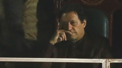Imran Khan: Pakistan's former Prime Minister, Imran Khan, gestures from behind a bullet-proof glass window. (Reuters)