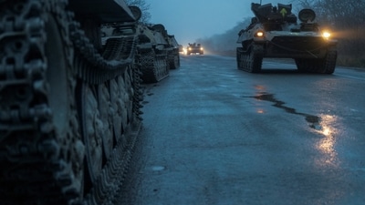 Russia-Ukraine War: Armoured personnel carriers of the Ukrainian Armed Forces are seen on a road. (Reuters)