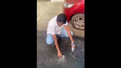 After roads in HSR Layout and Gandhinagar constituency, a road in Geethanjali Layout came off in bits and pieces when a resident picked at it with his hands.