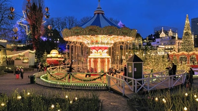 Copenhagen, Denmark: The Tivoli Gardens in Copenhagen have been a popular Christmastime destination for tourists for more than 170 years. It's simple to see why this Denmark attraction has endured for so long thanks to the Gardens' stunning light displays, market with over 60 booths, and Christmas trees decked up in thousands of lights. (istockphoto)