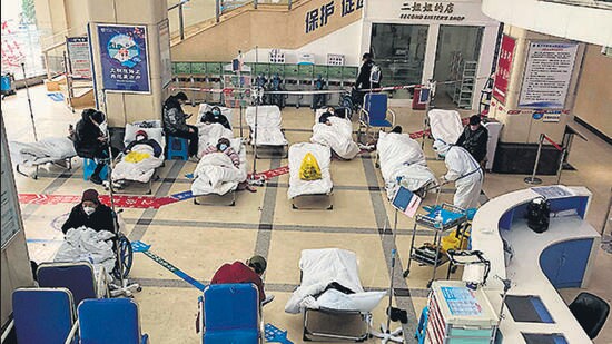 Covid-19 patients at a hospital in China’s Chongqing on Friday. (AFP)