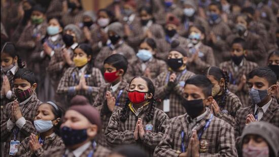 Students in a Jammu school wear masks as a precautionary measure against Covid on Friday. (PTI)