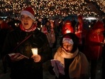 Fans of German soccer club 1. FC Union Berlin are seen gathered at the 'Stadion An der Alten Foersterei' stadium to sing traditional Christmas carols together, after a two-year break due to the coronavirus disease (COVID-19) pandemic, in Berlin, Germany, on December 23. (Annegret Hilse / Reuters)
