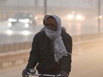 A cyclist braves the early morning chill and fog at NH 48 in New Delhi on Wednesday (HT Photo/Vipin Kumar) A cyclist braves the early morning chill and fog at NH 48 in New Delhi on Wednesday (HT Photo/Vipin Kumar)