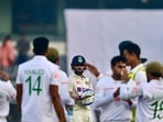 India's Virat Kohli (C) reacts after his dismissal by Bangladesh's Mehidy Hasan Miraz during the third day of the second cricket Test match between Bangladesh and India India's Virat Kohli (C) reacts after his dismissal by Bangladesh's Mehidy Hasan Miraz during the third day of the second cricket Test match between Bangladesh and India