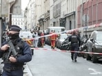 Paris Shooting: Members of emergency services work at the site where gunshots were fired.