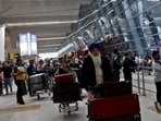 Travellers at Delhi Indira Gandhi international airport Travellers at Delhi Indira Gandhi international airport