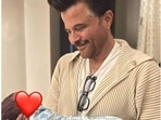 Anil Kapoor with Sonam Kapoor and with her son Vayu. Anil Kapoor with Sonam Kapoor and with her son Vayu.