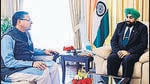 Uttarakhand Governor Lieutenant General Gurmit Singh (retd) with chief minister Pushkar Singh Dhami, as he approves the Anti-Conversion Amendment Bill passed by the state Legislative Assembly in November. (ANI)