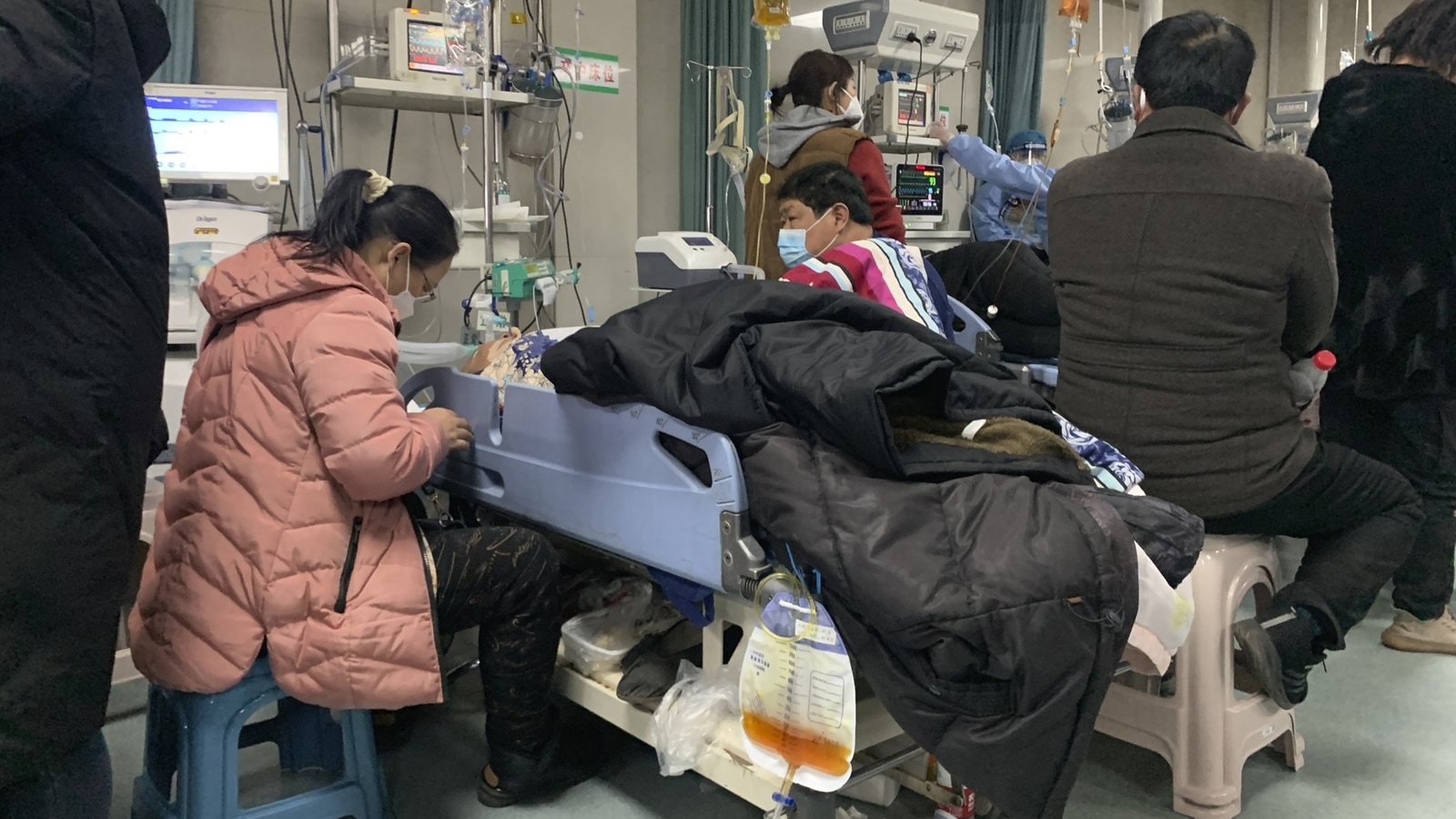 In China, ‘overflowing hospital morgues… worsening Covid yet to come ...