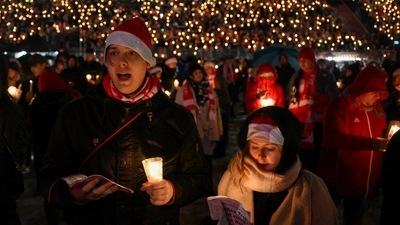 Fans of German soccer club 1. FC Union Berlin are seen gathered at the 'Stadion An der Alten Foersterei' stadium to sing traditional Christmas carols together, after a two-year break due to the coronavirus disease (COVID-19) pandemic, in Berlin, Germany, on December 23. (Annegret Hilse / Reuters) Fans of German soccer club 1. FC Union Berlin are seen gathered at the 'Stadion An der Alten Foersterei' stadium to sing traditional Christmas carols together, after a two-year break due to the coronavirus disease (COVID-19) pandemic, in Berlin, Germany, on December 23. (Annegret Hilse / Reuters)