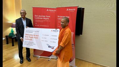 Officials of domestic carrier Akasa Air on Saturday greeted chief minister Yogi Adityanath by giving him the first symbolic boarding bass on the eve of the commencement of maiden flight of the airline from Lucknow. (Sourced)