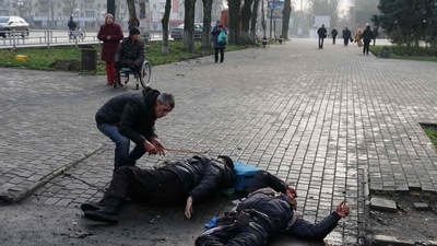 Russia-Ukraine War: A man examines laying bodies of civilian people after Russian shelling to Ukrainian city of Kherson. (AFP)