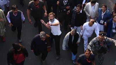 Rahul Gandhi was seen apparently throwing chocolate to people watching the yatra. (Raj k Raj/HT Photo) Rahul Gandhi was seen apparently throwing chocolate to people watching the yatra. (Raj k Raj/HT Photo)