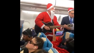 Screenshot of the video shows crew singing Christmas carols on board a Sri Lankan flight. (Twitter/NewsWire)