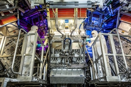 Breakthrough In Fusion Technology: National Ignition Facility Target Area operators inspect a final optics assembly (FOA) during a routine maintenance period. (AP)