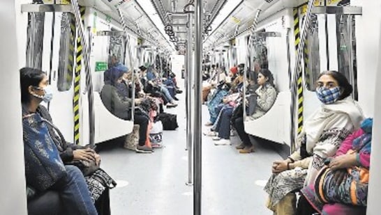 Women passengers inside a reserved coach on a Violet Line train on Saturday evening. (Sanchit Khanna/ht photo)