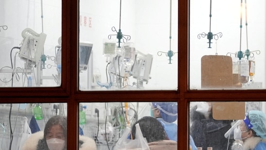 Covid Cases: Medical staffs work at a hospital, as coronavirus disease outbreaks continue in Shanghai, China.(Reuters)