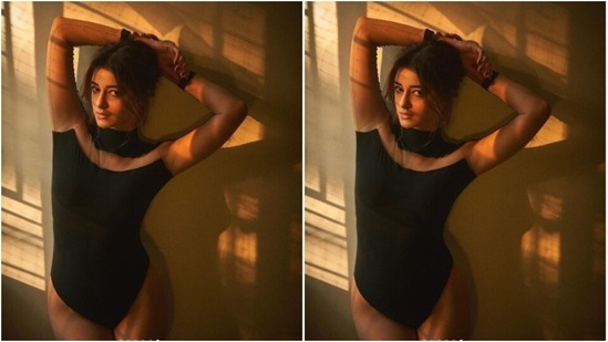 Ananya decked up in a black monokini featuring transparent details at the neckline and a part of the full sleeve. (Instagram/@ananyapanday)