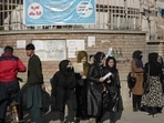 Afghanistan: Afghan women students stand outside the Kabul University.